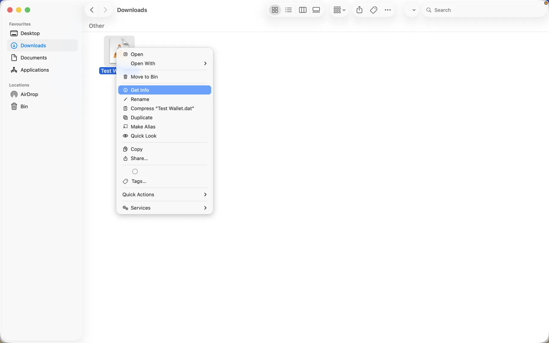 Finder context menu with Get Info selected for Test Wallet.dat